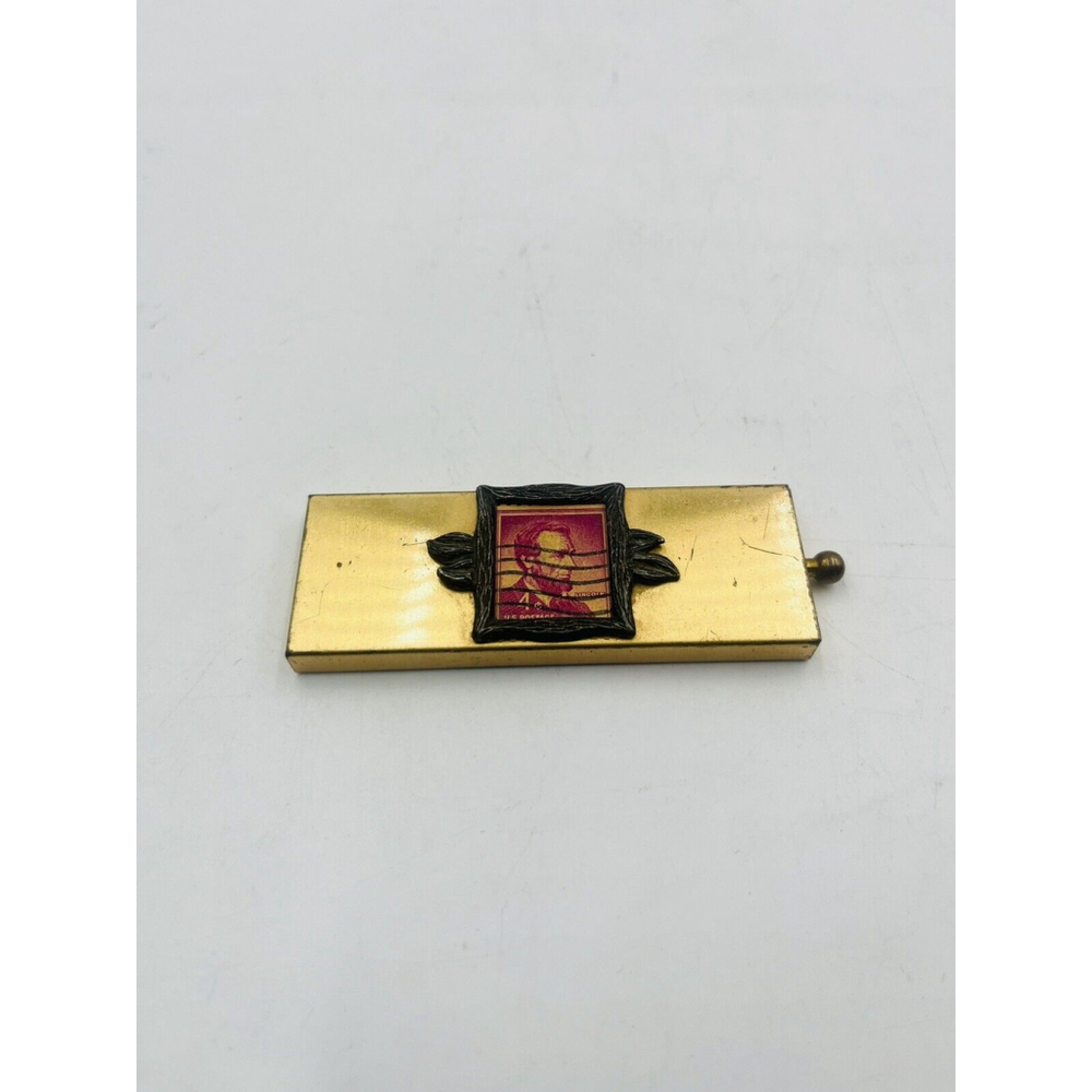Mid Century Gold Tone POSTAGE STAMP HOLDER. Excellent Preowned Condition.
